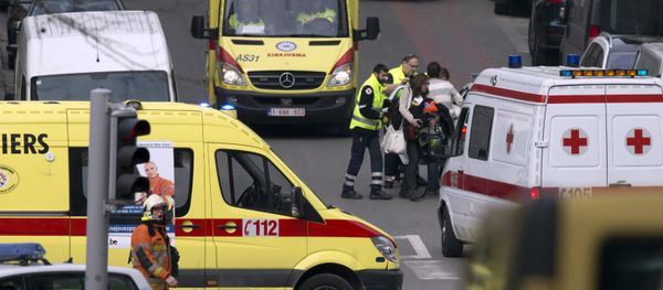 A woman is evacuated by emergency services after a explosion in a main metro station in Brussels on Tuesday, March 22, 2016 A woman is evacuated by emergency services after a explosion in a main metro station in Brussels on Tuesday, March 22, 2016 - Sputnik International