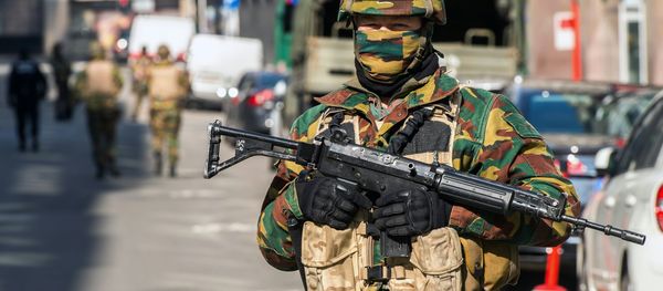A soldier blocks the access to roads close to the Maalbeek metro station in Brussels on March 22, 2016 after a series of apparently coordinated explosions ripped through Brussels airport and a metro train, killing at least 14 people in the airport and 20 people in the metro in the latest attacks to target Europe A soldier blocks the access to roads close to the Maalbeek metro station in Brussels on March 22, 2016 after a series of apparently coordinated explosions ripped through Brussels airport and a metro train, killing at least 14 people in the airport and 20 people in the metro in the latest attacks to target Europe - Sputnik International