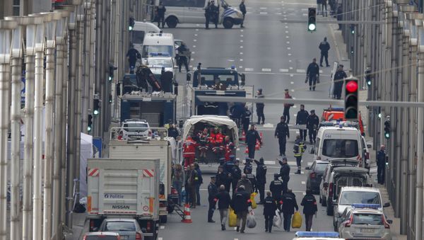 Belgian police and emergency personnel work near the Maalbeek metro station following an explosion in Brussels, Belgium, March 22, 2016 Belgian police and emergency personnel work near the Maalbeek metro station following an explosion in Brussels, Belgium, March 22, 2016 - Sputnik International