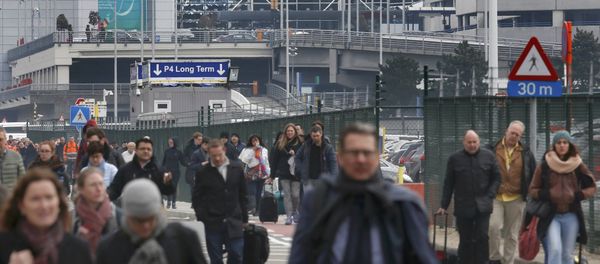People leave the scene of explosions at Zaventem airport near Brussels, Belgium, March 22, 2016 - Sputnik International