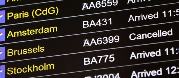 An arrivals board displays a cancelled flight from Brussels with an American Airlines code at Terminal 5, Heathrow Airport in London, Britain March 22, 2016 An arrivals board displays a cancelled flight from Brussels with an American Airlines code at Terminal 5, Heathrow Airport in London, Britain March 22, 2016 - Sputnik International