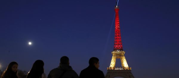 The Eiffel Tower is seen with the black, yellow and red colours of the Belgian flag in tribute to the victims of today's Brussels bomb attacks in Paris. The Eiffel Tower is seen with the black, yellow and red colours of the Belgian flag in tribute to the victims of today's Brussels bomb attacks in Paris. - Sputnik International