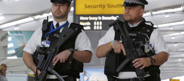 Armed police patrol at Terminal 5, Heathrow Airport in London, Britain March 22, 2016. Armed police patrol at Terminal 5, Heathrow Airport in London, Britain March 22, 2016. - Sputnik International