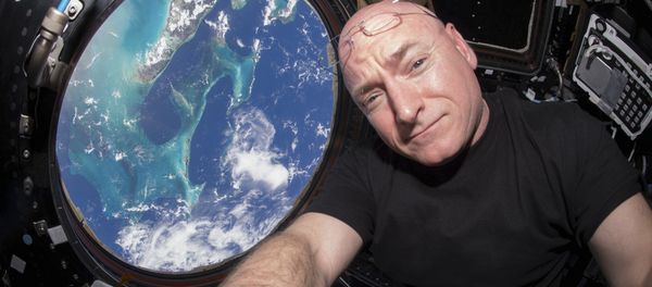 NASA astronaut Scott Kelly is seen inside the cupola of the International Space Station, a special module that provides a 360-degree viewing of the Earth and the station in this undated photo released on March 11, 2016 NASA astronaut Scott Kelly is seen inside the cupola of the International Space Station, a special module that provides a 360-degree viewing of the Earth and the station in this undated photo released on March 11, 2016 - Sputnik International