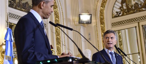 US President Barack Obama (L) and Argentinian President Mauricio Macri deliver a joint press conference at the Casa Rosada presidential palace in Buenos Aires on March 23, 2016 US President Barack Obama (L) and Argentinian President Mauricio Macri deliver a joint press conference at the Casa Rosada presidential palace in Buenos Aires on March 23, 2016 - Sputnik International