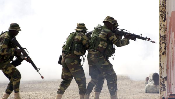 Senegalese soldiers take part on a large annual military exercise, known as Flintlock, on February 24, 2016, in Thies. The exercise has been bringing together African, European and US counter-terrorism forces every year for the past decade - Sputnik International