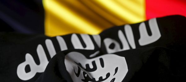 Islamic State flag is seen in front of a Belgian flag in this illustration taken March 22, 2016 Islamic State flag is seen in front of a Belgian flag in this illustration taken March 22, 2016 - Sputnik International