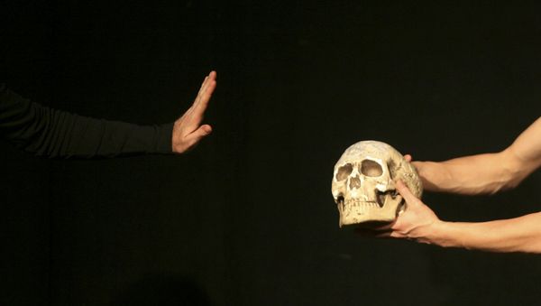 An actor performs during William Shakespeare's theatre play Hamlet at the Jerusalem Centre for the Performing Arts in this file photograph dated December 11, 2008. - Sputnik International