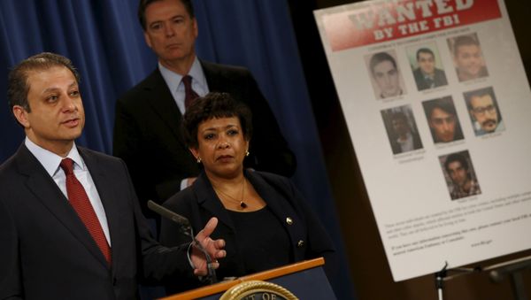 Manhattan U.S. Attorney Preet Bharara (L-R), Federal Bureau of Investigation Director James Comey and U.S. Attorney General Loretta Lynch hold a news conference to announce indictments on Iranian hackers for a coordinated campaign of cyber attacks in 2012 and 2013 on several U.S. banks and a New York dam, at the Justice Department in Washington March 24, 2016 Manhattan U.S. Attorney Preet Bharara (L-R), Federal Bureau of Investigation Director James Comey and U.S. Attorney General Loretta Lynch hold a news conference to announce indictments on Iranian hackers for a coordinated campaign of cyber attacks in 2012 and 2013 on several U.S. banks and a New York dam, at the Justice Department in Washington March 24, 2016 - Sputnik International