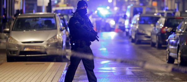 A masked Belgian police takes part in police operations in Schaerbeek following Tuesday's bomb attacks in Brussels, Belgium, March 25, 2016. A masked Belgian police takes part in police operations in Schaerbeek following Tuesday's bomb attacks in Brussels, Belgium, March 25, 2016. - Sputnik International