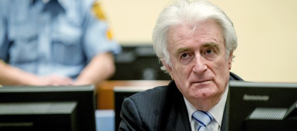 Bosnian Serb wartime leader Radovan Karadzic sits in the courtroom for the reading of his verdict at the International Criminal Tribunal for Former Yugoslavia (ICTY) in The Hague, on March 24, 2016. Bosnian Serb wartime leader Radovan Karadzic sits in the courtroom for the reading of his verdict at the International Criminal Tribunal for Former Yugoslavia (ICTY) in The Hague, on March 24, 2016. - Sputnik International