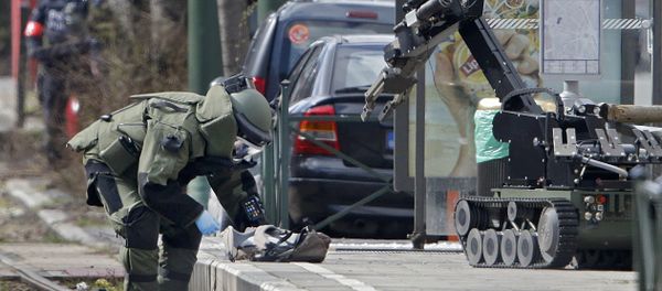 Police use a robotic device as they take part in a search in the Brussels borough of Schaerbeek following Tuesday's bombings in Brussels, Belgium Police use a robotic device as they take part in a search in the Brussels borough of Schaerbeek following Tuesday's bombings in Brussels, Belgium - Sputnik International