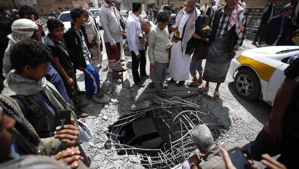 People stand around damages made by a Saudi-led airstrike on a bridge in Sanaa, Yemen, Wednesday, March 23, 2016. Yemen has been left fragmented by war pitting Shiite Houthi rebels and military units loyal to a former president against a US-backed, Saudi-led coalition supporting the internationally recognized government. People stand around damages made by a Saudi-led airstrike on a bridge in Sanaa, Yemen, Wednesday, March 23, 2016. Yemen has been left fragmented by war pitting Shiite Houthi rebels and military units loyal to a former president against a US-backed, Saudi-led coalition supporting the internationally recognized government. - Sputnik International