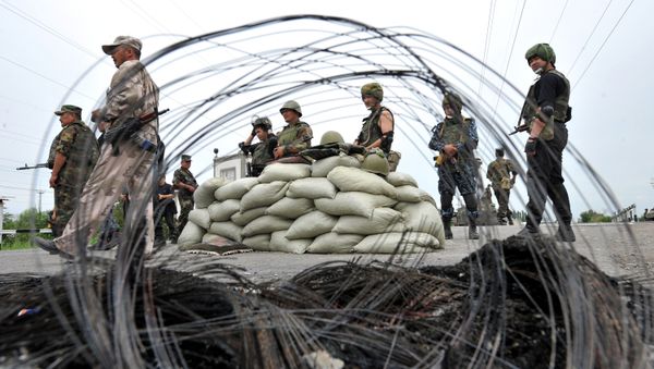 Kyrgyz special unit police officers stand by during patrol at a check point in Osh (file) Kyrgyz special unit police officers stand by during patrol at a check point in Osh (file) - Sputnik International