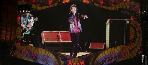 Mick Jagger of the Rolling Stones is seen on a giant screen as he performs during a free outdoor concert at Ciudad Deportiva de la Habana sports complex in Havana, March 25, 2016. - Sputnik International