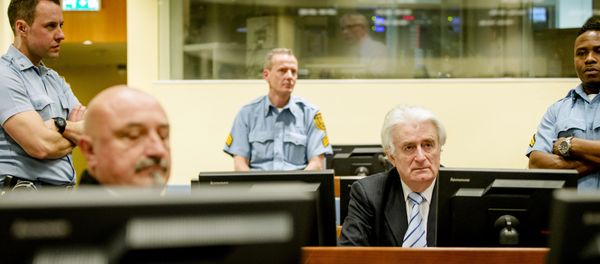 Ex-Bosnian Serb leader Radovan Karadzic sits in the court of the International Criminal Tribunal for former Yugoslavia (ICTY) in the Hague, the Netherlands March 24, 2016. Ex-Bosnian Serb leader Radovan Karadzic sits in the court of the International Criminal Tribunal for former Yugoslavia (ICTY) in the Hague, the Netherlands March 24, 2016. - Sputnik International