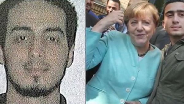 Merkel and refugee selfie Merkel and refugee selfie - Sputnik International