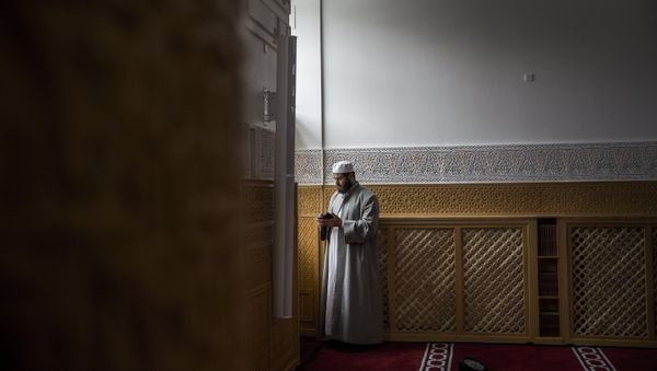 A man during the official opening of Denmark's first mosque with a dome and minaret in Rovsingsgade, Copenhagen A man during the official opening of Denmark's first mosque with a dome and minaret in Rovsingsgade, Copenhagen - Sputnik International