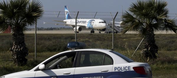Police stand guard at Larnaca Airport near a hijacked Egyptair Airbus A320 , March 29, 2016 Police stand guard at Larnaca Airport near a hijacked Egyptair Airbus A320 , March 29, 2016 - Sputnik International