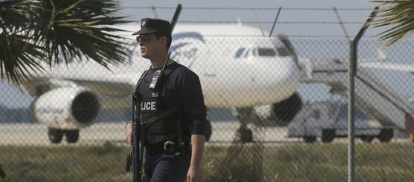 Police stand guard at Larnaca Airport near a hijacked Egyptair Airbus A320 , March 29, 2016 Police stand guard at Larnaca Airport near a hijacked Egyptair Airbus A320 , March 29, 2016 - Sputnik International