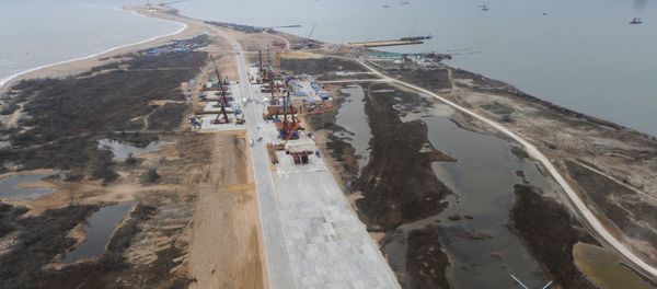 A bird's eye view of the Tuzla Island where construction of a bridge across the Kerch Strait takes place. March 18, 2016. A bird's eye view of the Tuzla Island where construction of a bridge across the Kerch Strait takes place. March 18, 2016. - Sputnik International