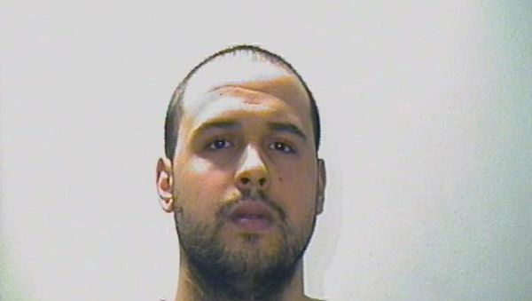 A man, whom Interpol said is named Khalid El Bakraoui, is seen in this undated photo issued by Interpol on their website and obtained March 23, 2016, after he was suspected of involvement in the Brussels airport and metro attack - Sputnik International