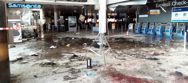 Damage is seen inside the departure terminal following the March 22, 2016 bombing at Zaventem Airport, in these undated photos made available to Reuters by the Belgian newspaper Het Nieuwsblad, in Brussels, Belgium, March 29, 2016. - Sputnik International