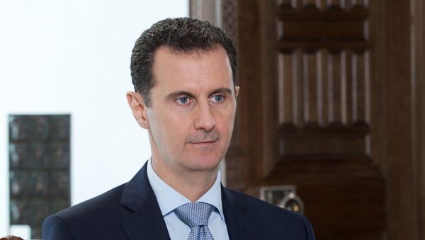 Syrian President Bashar al-Assad during an interview with Rossiya Segodnya Director General Dmitry Kiselev Syrian President Bashar al-Assad during an interview with Rossiya Segodnya Director General Dmitry Kiselev - Sputnik International