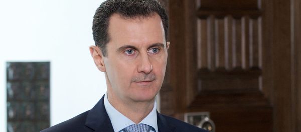 Syrian President Bashar al-Assad during an interview with Rossiya Segodnya Director General Dmitry Kiselev - Sputnik International