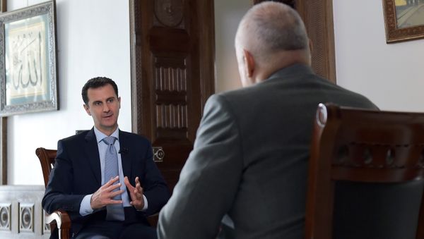 Syrian President Bashar al-Assad's interview with Rossiya Segodnya Director General Dmitry Kiselev Syrian President Bashar al-Assad's interview with Rossiya Segodnya Director General Dmitry Kiselev - Sputnik International