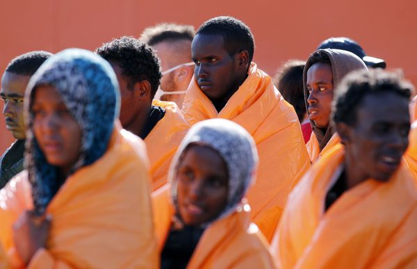 Migrants stand in line after disembarking from the Norwegian vessel Siem Pilot at Pozzallo's harbour, Italy, March 29, 2016. Migrants stand in line after disembarking from the Norwegian vessel Siem Pilot at Pozzallo's harbour, Italy, March 29, 2016. - Sputnik International