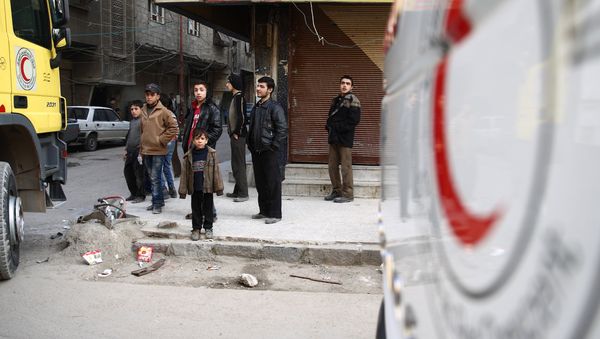 A convoy of the Syrian Red Crescent entered the Douma area bringing medicines and also milk for children (File) A convoy of the Syrian Red Crescent entered the Douma area bringing medicines and also milk for children (File) - Sputnik International