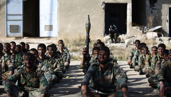 Syrian youths take part in their last training on December 8, 2014 before being sent to the frontline along with rebel fighters from the Jaysh al-Islam brigades (Army of Islam) in Eastern al-Ghouta, a rebel-held region outside the capital Damascus Syrian youths take part in their last training on December 8, 2014 before being sent to the frontline along with rebel fighters from the Jaysh al-Islam brigades (Army of Islam) in Eastern al-Ghouta, a rebel-held region outside the capital Damascus - Sputnik International