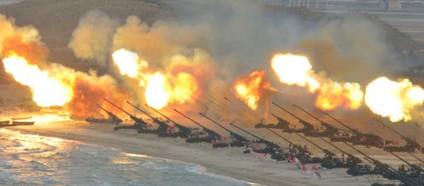 Artillery pieces are seen being fired during a military drill at an unknown location, in this undated photo released by North Korea's Korean Central News Agency (KCNA) on March 25, 2016 Artillery pieces are seen being fired during a military drill at an unknown location, in this undated photo released by North Korea's Korean Central News Agency (KCNA) on March 25, 2016 - Sputnik International