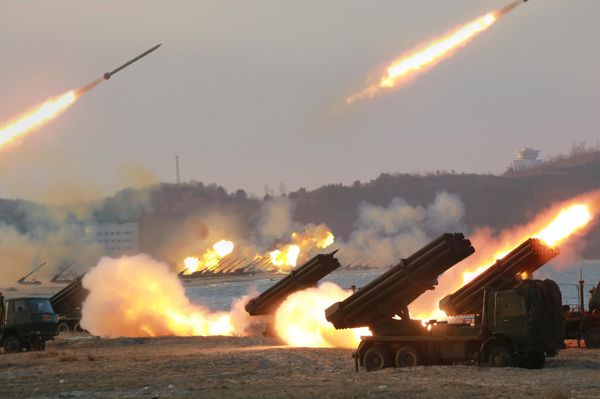 Multiple rocket launchers are seen being fired during a military drill at an unknown location, in this undated photo released by North Korea's Korean Central News Agency (KCNA) on March 25, 2016 Multiple rocket launchers are seen being fired during a military drill at an unknown location, in this undated photo released by North Korea's Korean Central News Agency (KCNA) on March 25, 2016 - Sputnik International
