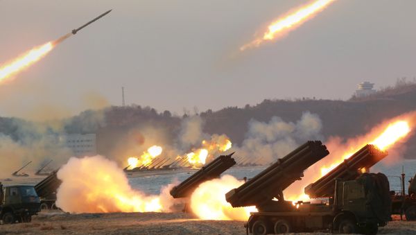 Multiple rocket launchers are seen being fired during a military drill at an unknown location, in this undated photo released by North Korea's Korean Central News Agency (KCNA) on March 25, 2016 Multiple rocket launchers are seen being fired during a military drill at an unknown location, in this undated photo released by North Korea's Korean Central News Agency (KCNA) on March 25, 2016 - Sputnik International