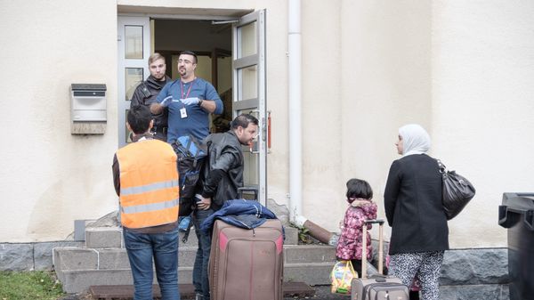 Migrants arrive at a refugee reception centre in Tornio, Finland Migrants arrive at a refugee reception centre in Tornio, Finland - Sputnik International