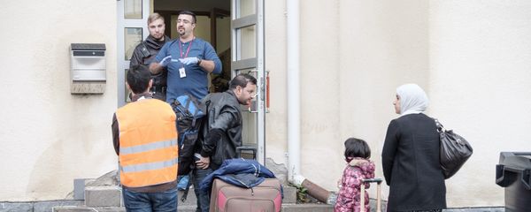 Migrants arrive at a refugee reception centre in Finland Migrants arrive at a refugee reception centre in Finland - Sputnik International