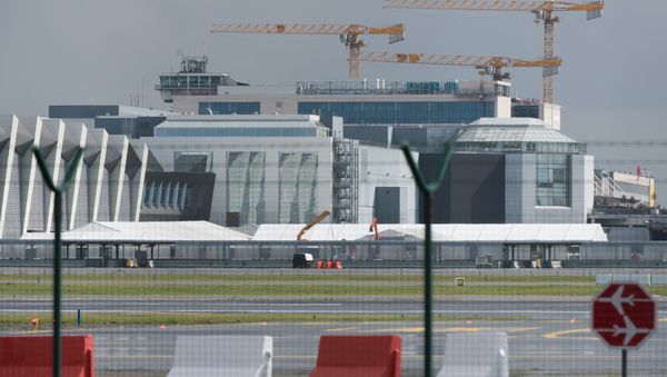 A picture taken on March 29, 2016 in Zaventem shows tents at Brussels Airport, where authorities are running a series of tests to see if makeshift check-in facilities are good enough to restart some flights and that repair work and new security measures are adequate after the deadly March 22 attacks - Sputnik International