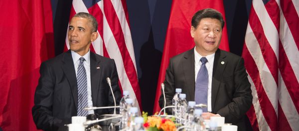 US President Barack Obama (L) sits with Chinese President Xi Jinxing during a bilateral meeting ahead of the opening of the UN conference on climate change COP21 (File) - Sputnik International