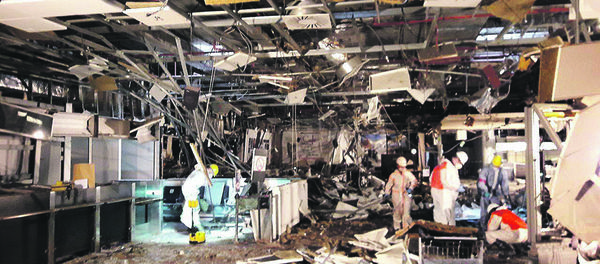Damage is seen inside the departure terminal following the March 22, 2016 bombing at Zaventem Airport, in these undated photos made available to Reuters by the Belgian newspaper Het Nieuwsblad, in Brussels, Belgium, March 29, 2016 - Sputnik International