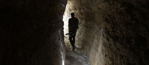 A Syrian army soldier makes his way in a tunnel reportedly previously used by rebel fighters in Jobar, a mostly rebel-held area on the eastern outskirts of Damascus on June 2, 2014 A Syrian army soldier makes his way in a tunnel reportedly previously used by rebel fighters in Jobar, a mostly rebel-held area on the eastern outskirts of Damascus on June 2, 2014 - Sputnik International