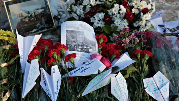 Flowers laid at the monument to pilots in the Russian city of Lipetsk in memory of Oleg Peshkov Flowers laid at the monument to pilots in the Russian city of Lipetsk in memory of Oleg Peshkov - Sputnik International