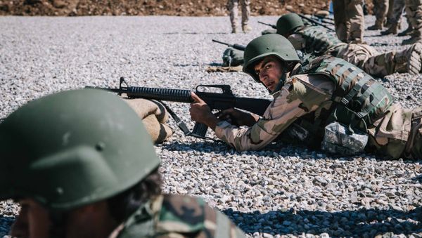 Kurdish Peshmerga soldier aim their weapons during a military training session held by Dutch army trainers at a shooting range, at Bnaslawa Military Base in Irbil, northern Iraq, Wednesday, March 9, 2016 Kurdish Peshmerga soldier aim their weapons during a military training session held by Dutch army trainers at a shooting range, at Bnaslawa Military Base in Irbil, northern Iraq, Wednesday, March 9, 2016 - Sputnik International