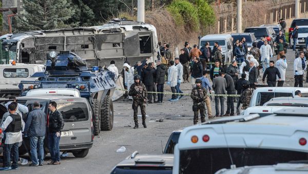 Turkish special force police officers walk at the site of a bomb attack in Diyarbakir, southeastern Turkey, on March 31, 2016 Turkish special force police officers walk at the site of a bomb attack in Diyarbakir, southeastern Turkey, on March 31, 2016 - Sputnik International