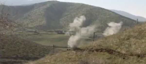 Smoke rises after clashes between Armenian and Azeri forces in Nagorno-Karabakh region in this still image taken from video provided by the Nagorno-Karabakh region Defence Ministry April 2, 2016. Smoke rises after clashes between Armenian and Azeri forces in Nagorno-Karabakh region in this still image taken from video provided by the Nagorno-Karabakh region Defence Ministry April 2, 2016. - Sputnik International