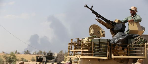 An Iraqi army member mans a tank on the outskirts of Baiji refinery north of Tikrit An Iraqi army member mans a tank on the outskirts of Baiji refinery north of Tikrit - Sputnik International