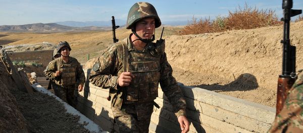 Armenian soldiers of the self-proclaimed republic of Nagorno-Karabakh walking in trenches at the frontline on the border with Azerbaijan. Armenian soldiers of the self-proclaimed republic of Nagorno-Karabakh walking in trenches at the frontline on the border with Azerbaijan. - Sputnik International