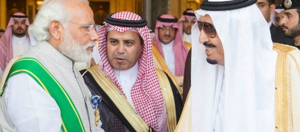 Saudi King Salman (R) shakes hands with India's Prime Minister Narendra Modi in Riyadh, Saudi Arabia - Sputnik International
