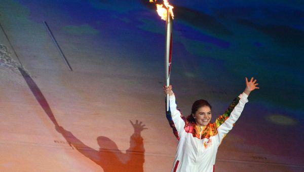Torch-bearer, State Duma deputy Alina Kabayeva takes part in the final stage of the Olympic Torch Relay at the opening ceremony of the XXII Olympic Winter Games in Sochi. (File) - Sputnik International